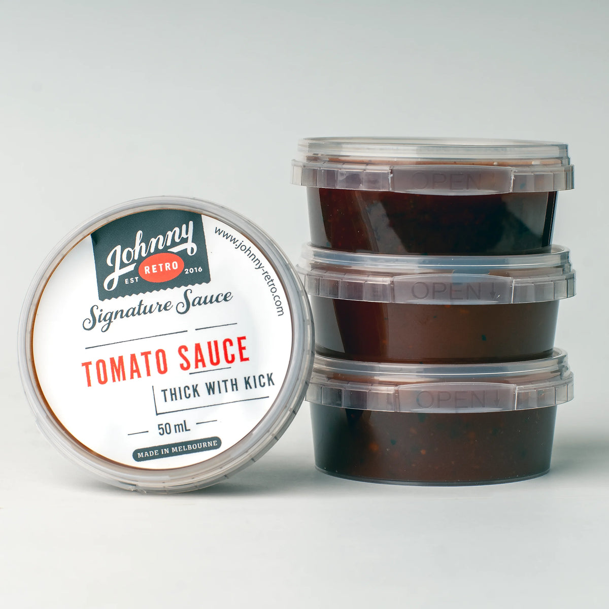 Johnny Retro Thick with Kick Tomato Sauce carton with 48 single-serve 50 mL containers