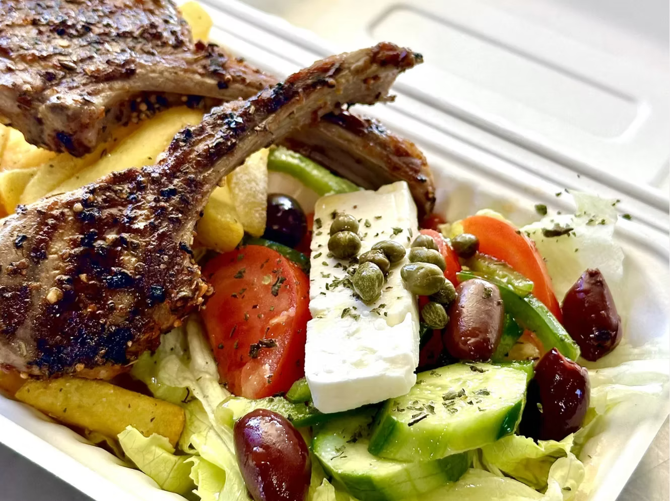 GRILLED LAMB WITH MAPLE'S MONTREAL STEAK SPICE & VILLAGE GREEK SALAD