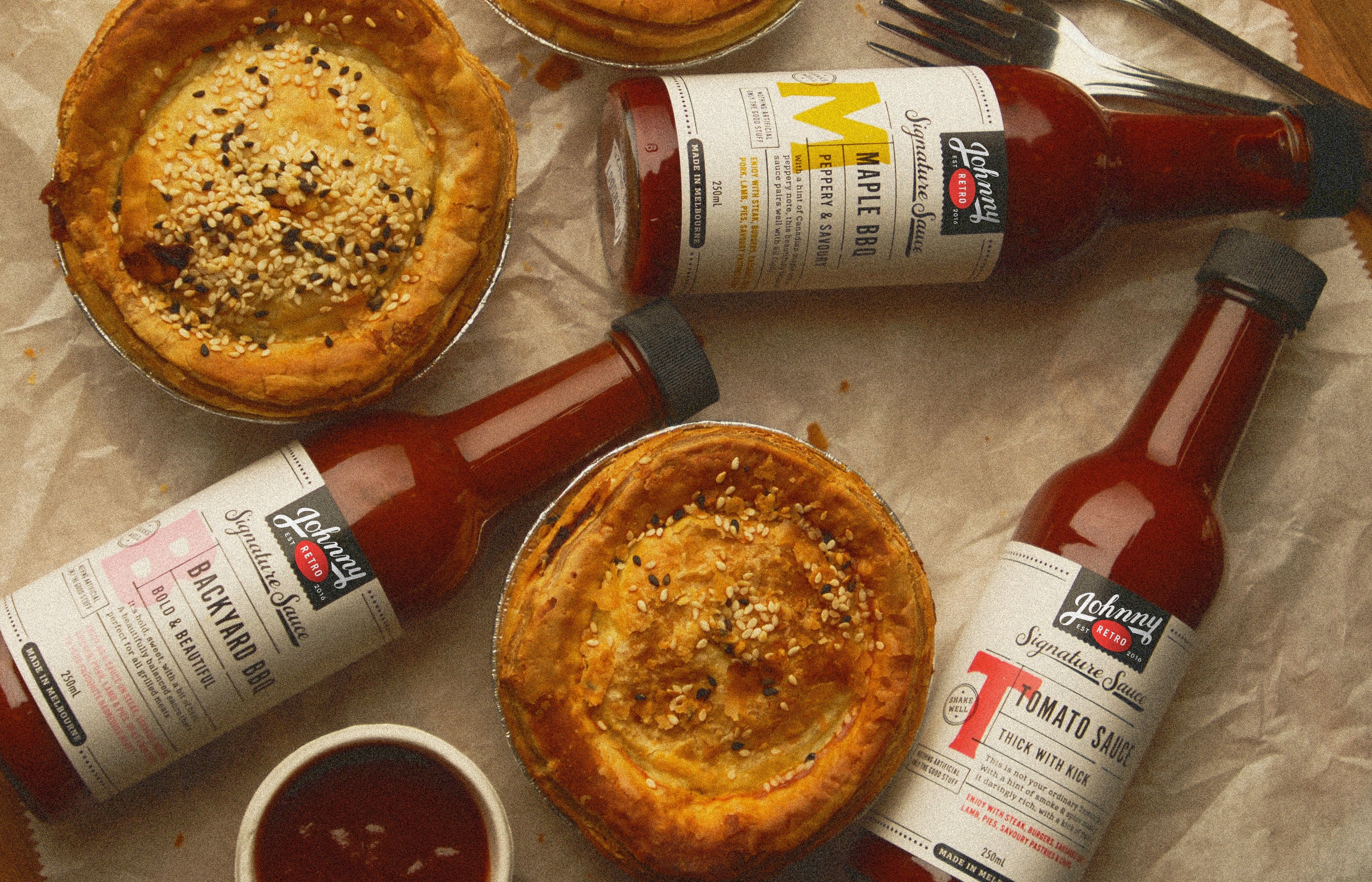 Signature BBQ Sauces with Pies on a textured background